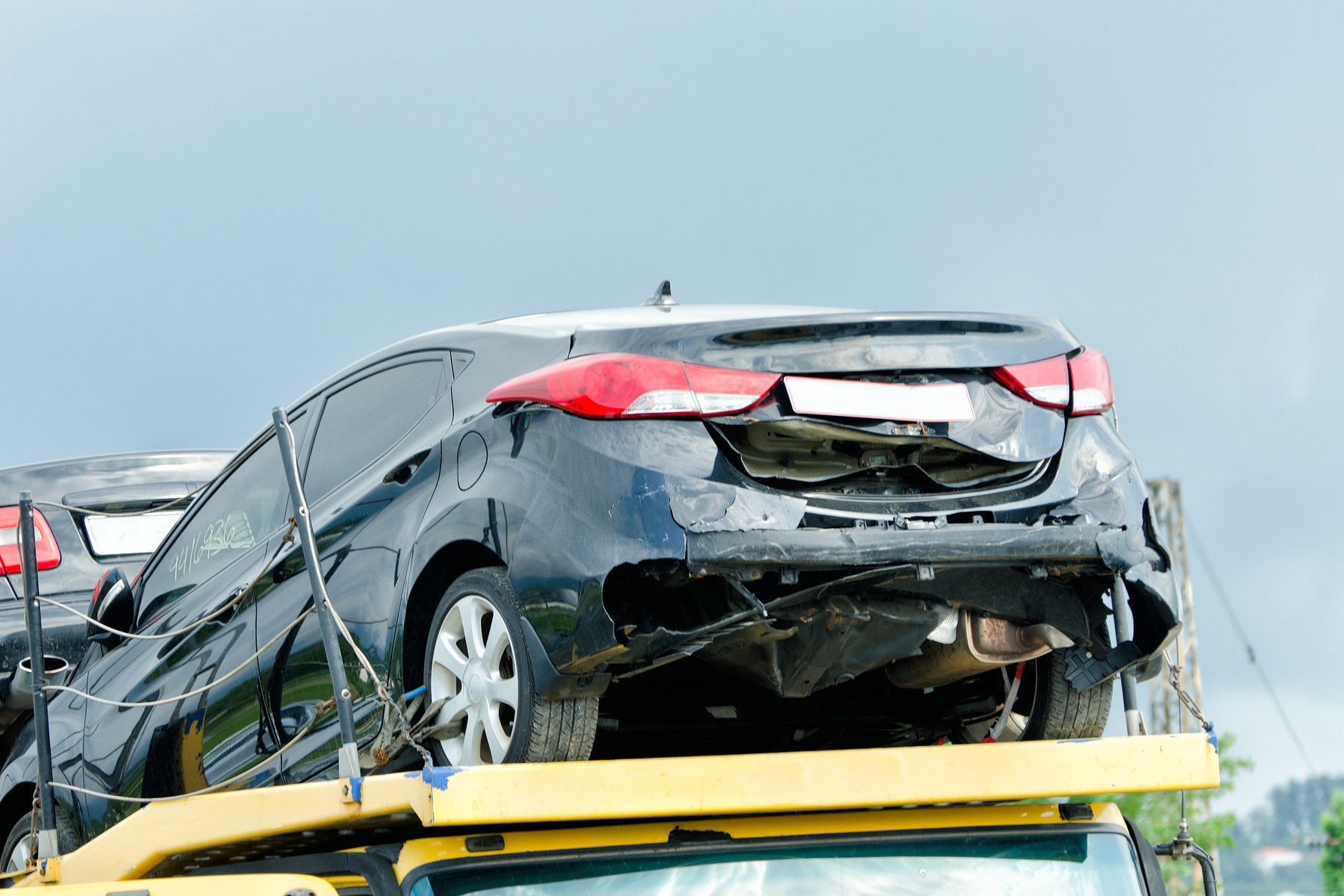 Broken Car on the Tow Truck